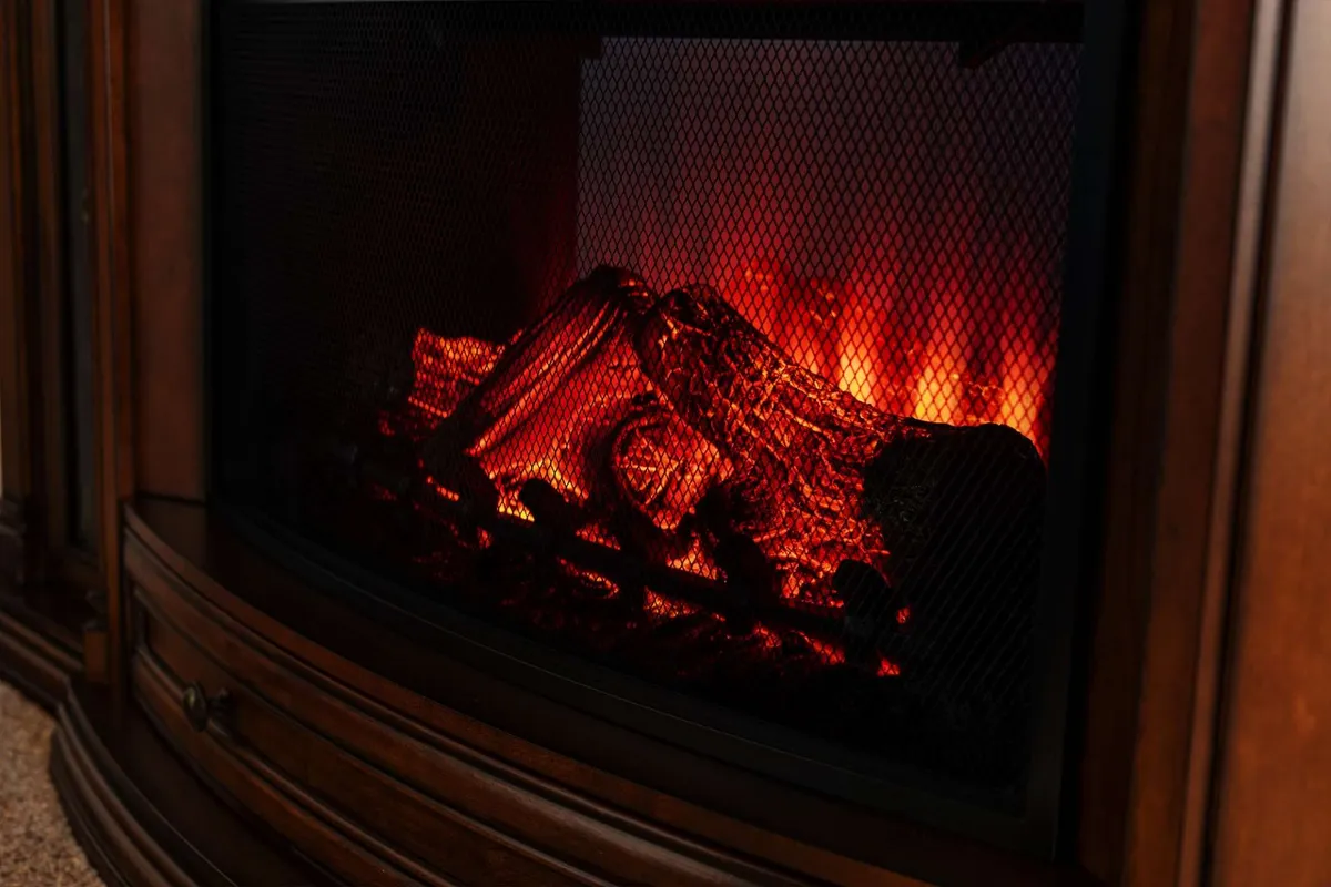 A warm interior scene with a glowing fireplace and comfortable seating, evoking a sense of comfort and togetherness perfect for evenings spent sharing stories or enjoying a drink after a day out.